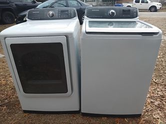 White Samsung washer and dryer