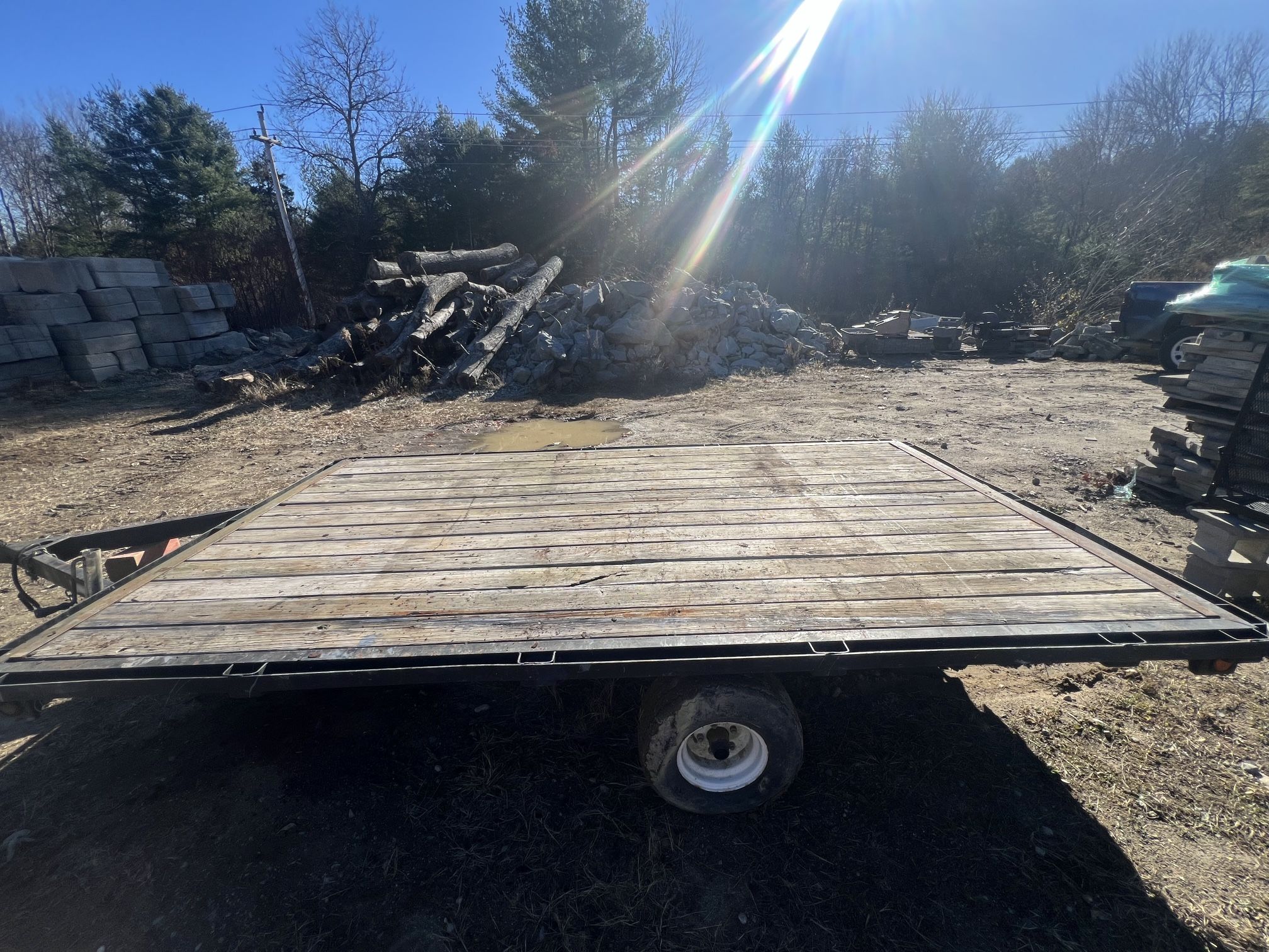 ATV open trailer with slide under ramps