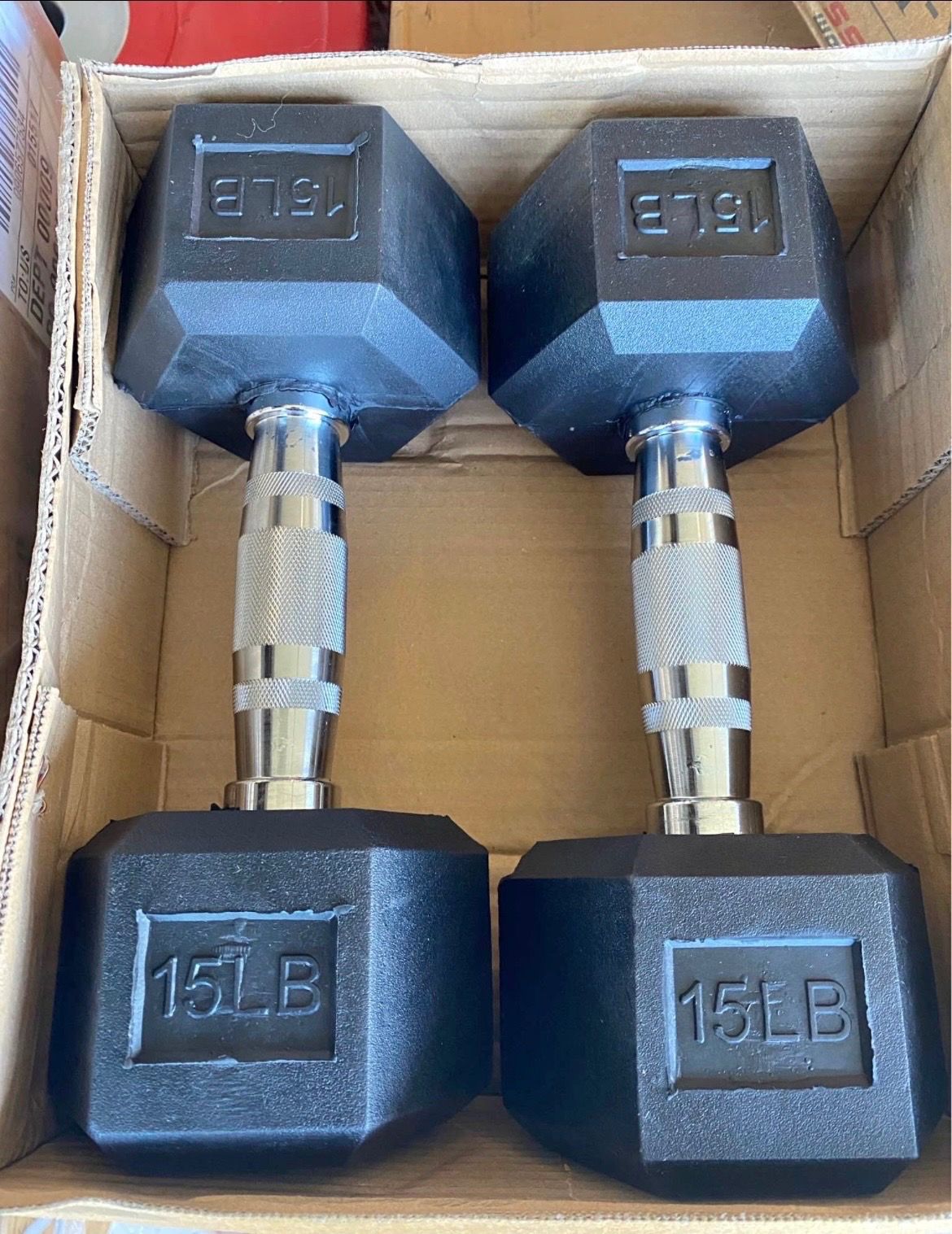 New pair of 15 pounds dumbbells