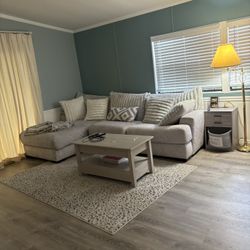 L sectional couch and rug 