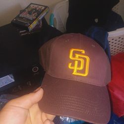 Brand new one size fits all Padres hats
