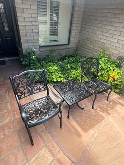 Patio set. All metal. Chairs. With table. Very nice condition.
