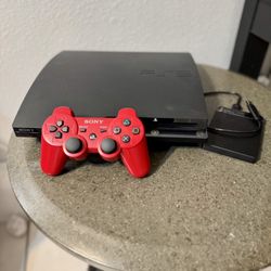 Sony PlayStation 3 Slim With Over 60 Games