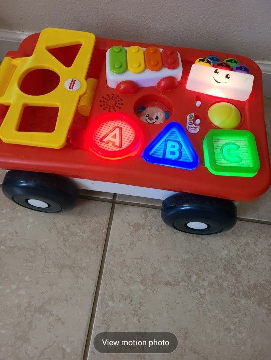 Fisher-Price Baby & Toddler Toy Laugh & Learn Pull & Play Learning Wagon