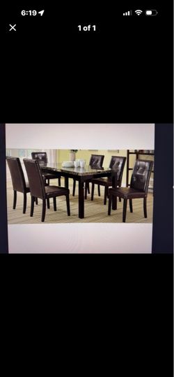 Dining room marble table and 6 Brown  chairs