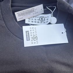 SUPREME X MAISON MARGIELA COTTON FOOTBALL JERSEY BLACK  MEDIUM IN HAND