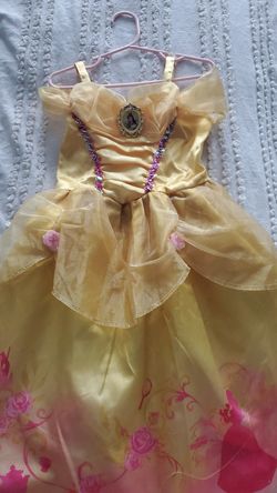 4T Cinderella dress has small hole by the tag. Tried taking the tag off and ripped it(pic in 2nd pic) price negotiable