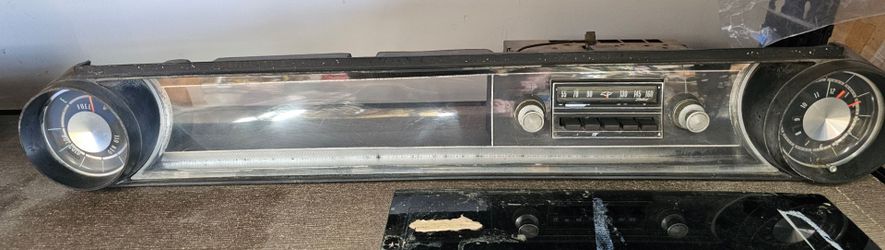 1965 Impala dash insert with radio.