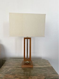 Mcm walnut and brass table lamp