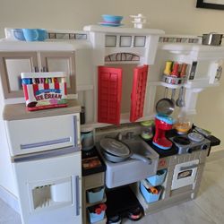 Clean And Perfect; Kids Kitchen With Cafe Door To Serve Customers 
