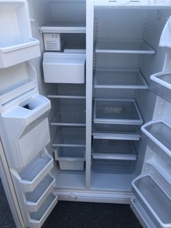 Side by side white kitchen appliance set