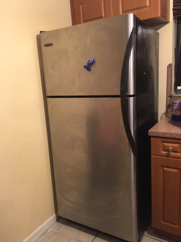 Steel top load fridge and freezer with ice maker must go.