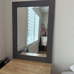 Gray framed mirror 24 x 34”