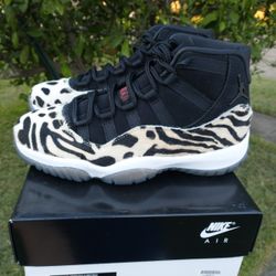New Women's Air Jordan 11 Retro Size 7.5 Animal Instinct 