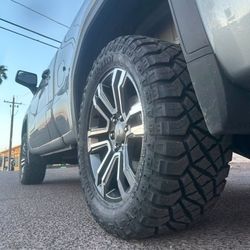 20x9 6x139 GMC Rims And Tires 33/1250/20 Onyx RT LT