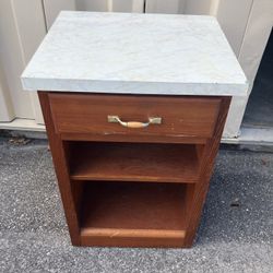 Beautiful Wooden Nightstand With Drawer And Marble Wrap