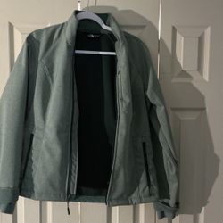 Genuine North face Windbreaker Jacket, With Drawstring Size Medium, Rarely Worn, Like New