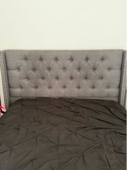 Full size grey bed