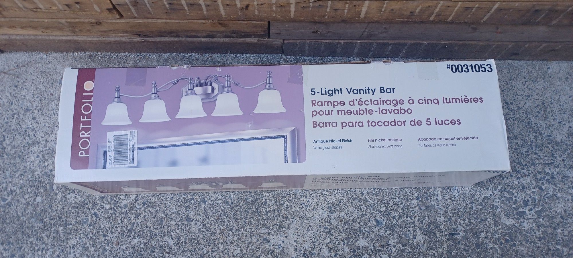 Portfolio 5 light vanity bar BRAND NEW IN BOX 
NEVER USED