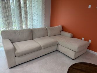 Beige couch with chaise