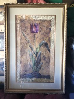 Gold framed wall art with glass