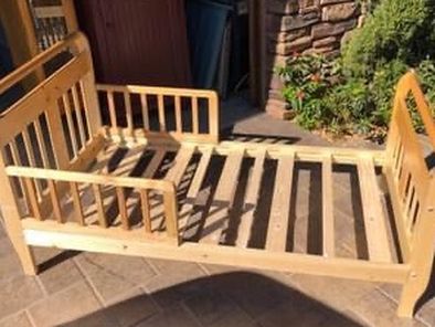 Child’s wooden bed 29” wide 55” long 28” high