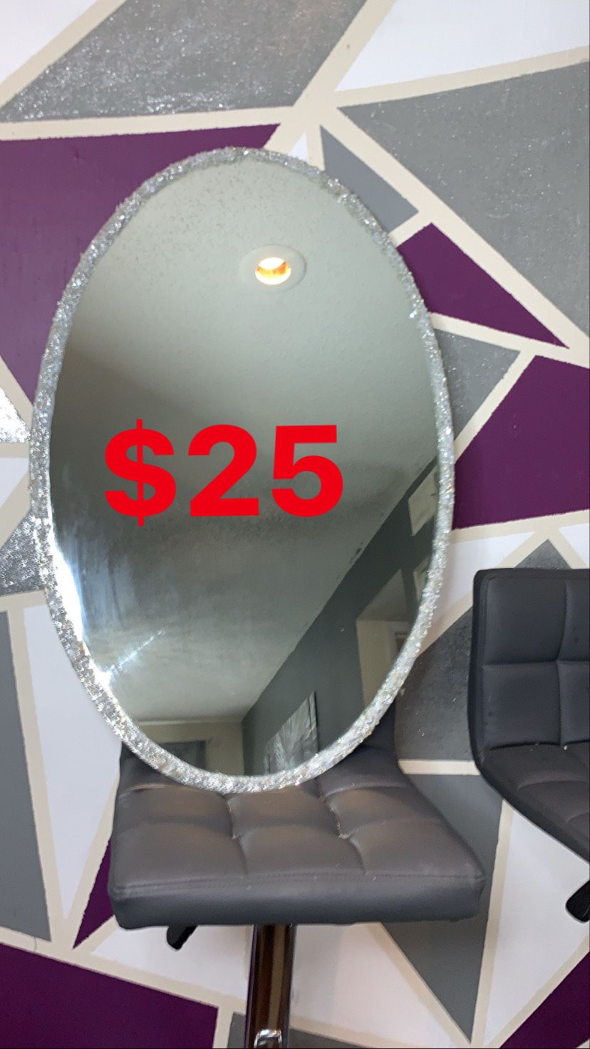 Oval crushed glass wall mirror