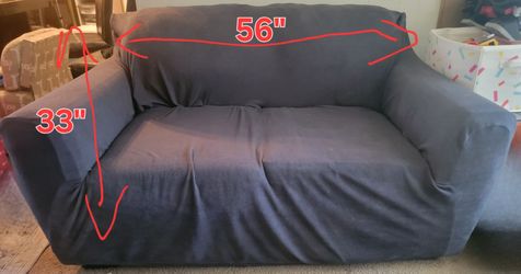 Black leather love seat/sofa