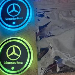 Mercedes, Lexus, BMW or Cadillac Led Color Changing USB charged Car Cupholder Coasters.  Colors slowly fade from one color to the next.