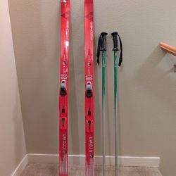 Child / kid Cross Country skis by Fischer Austria. Cross Country Crown with binders and 42" Salomon aluminum poles.  Skis are 140 / N640 