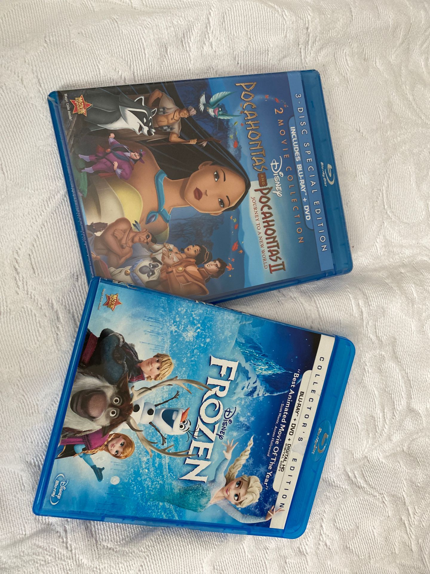 10$ PER ITEM. Pocahontas I &II / Frozen. BRAND NEW! Both movies also come with NO slip cover.