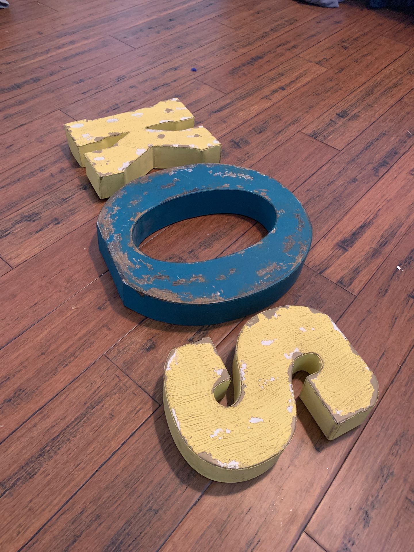 Metal hanging letters K, O, S