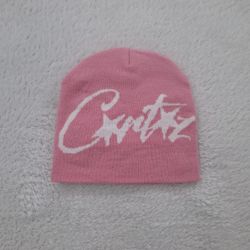 Pink Corteiz beanie with white logo