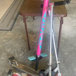 2 Razor Scooters And Pogo Stick