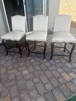 3 counter height bar stools from Pier One