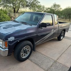 93. Nissan extended cab, pick up.