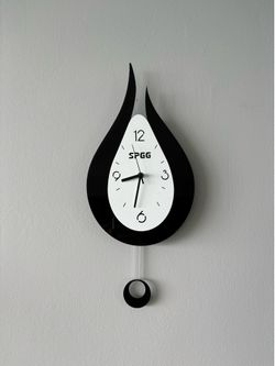 Wall clock with pendulum