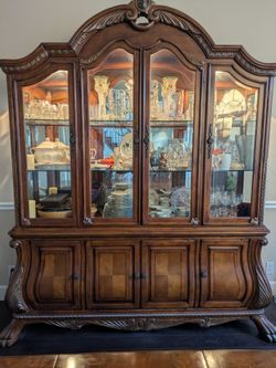 Dining table and  chairs with lighted hutch