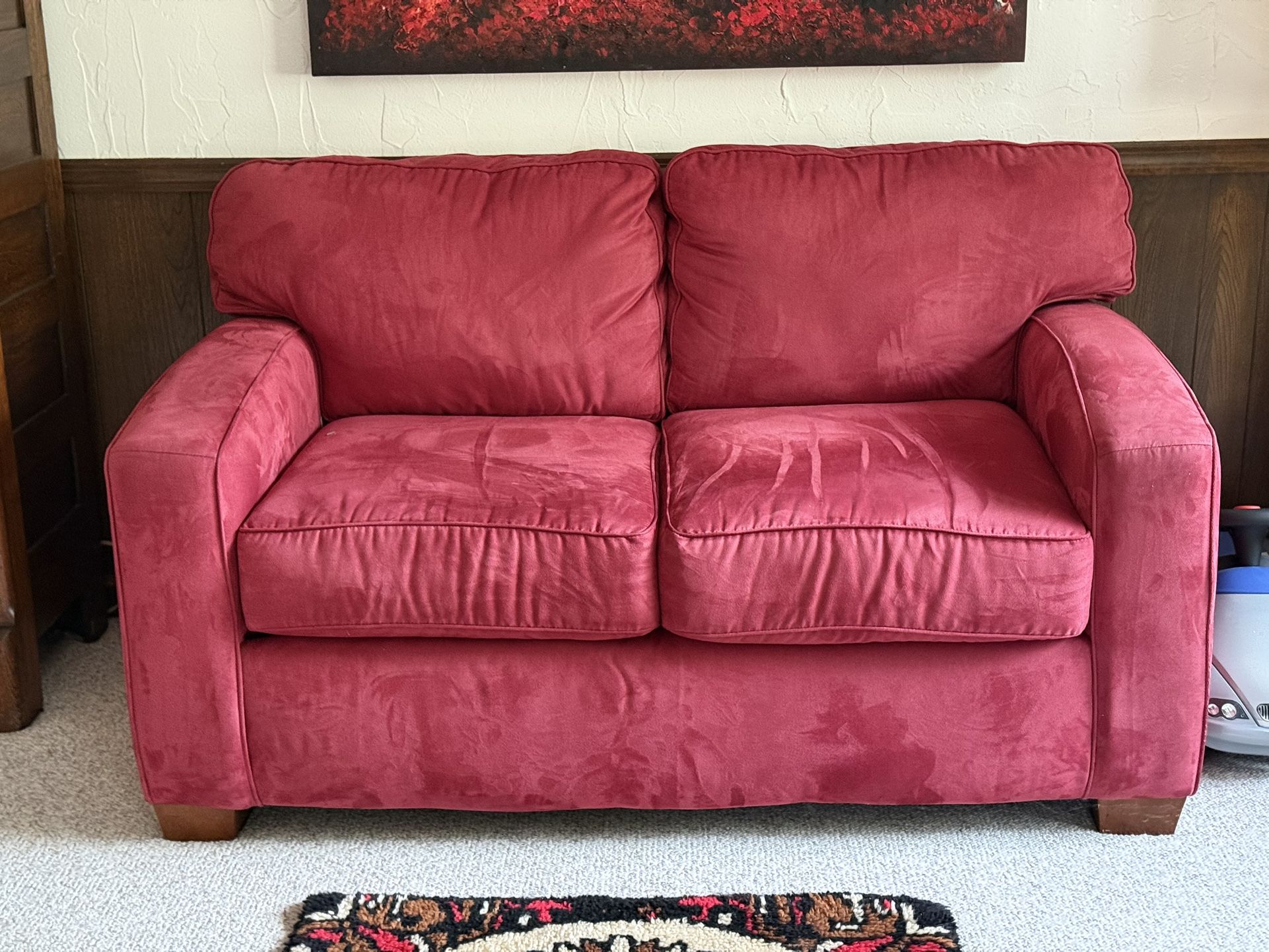 red microfiber love seat