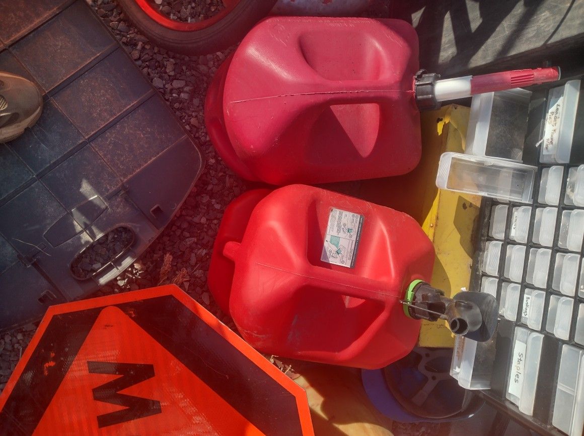 Two Gas Cans Selling Together