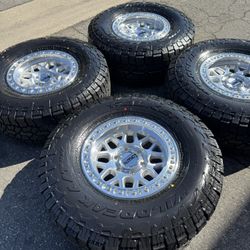 KMC KM549 GRS 6x5.5 Wheels with 35” Falken WildPeak AT4W Tires CHEVY GMC TOYOTA