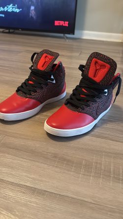 This is a Nike Kobe 9 NSW Lifestyle 'University Red' sneaker. Size 9M