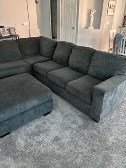 Large sectional couch with ottoman