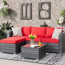 Patio Furniture Set New in Original Packaging’s With Sectional Sofa, Coffee Table, and Premium Polyester Red Cushions. 