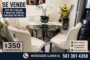 Glass table and 4 elegant chairs.
