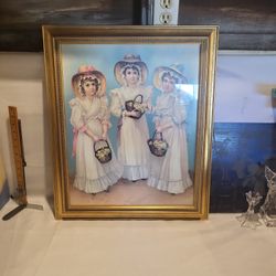Vintage framed picture of three girls holding flowers