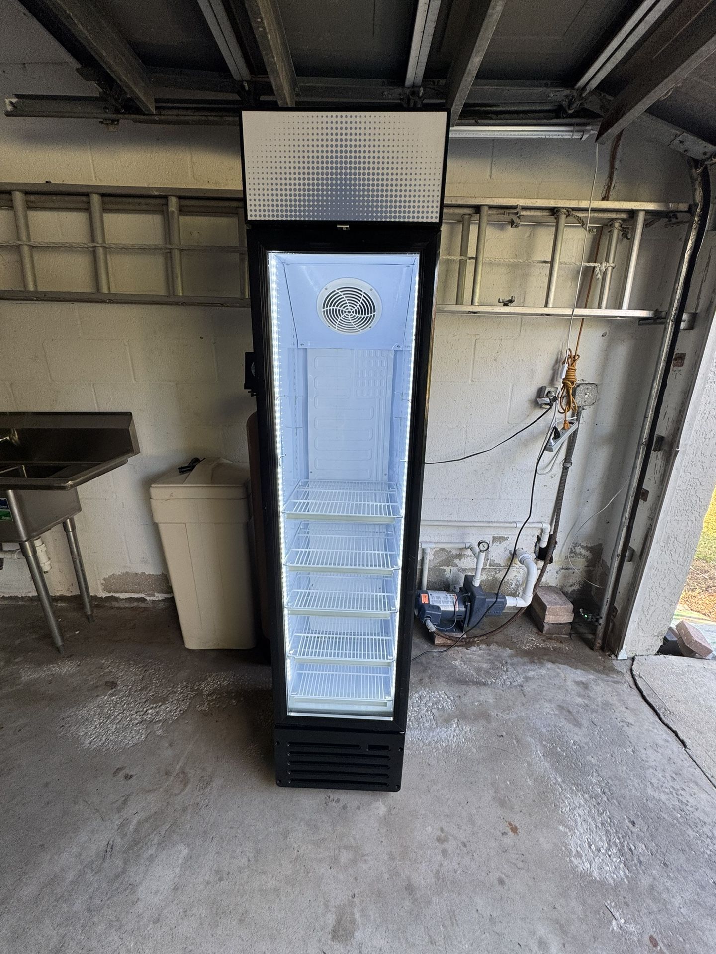commercial beverage refrigerator with a glass door.