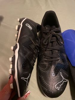 Soccer cleats and shin guards size 10 shoe and large for guards