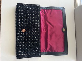 Black Cole Haan Izzie Large Clutch with a heritage woven design. Rarely used