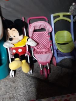 Kids doll strollers, one on left is $5, middle is $20 , right is $3